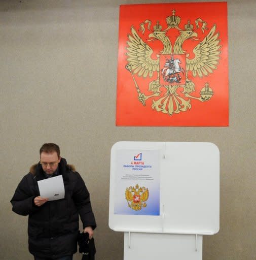 Six observers watched the presidential election vote in one Moscow polling station, often outnumbering the voters, while wires trailed from an unobtrusive webcam mounted on a column opposite the ballot boxes