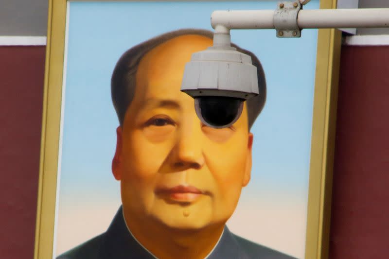 FILE PHOTO: Security camera overlooks Tiananmen Square in front of a portrait of Mao in Beijing