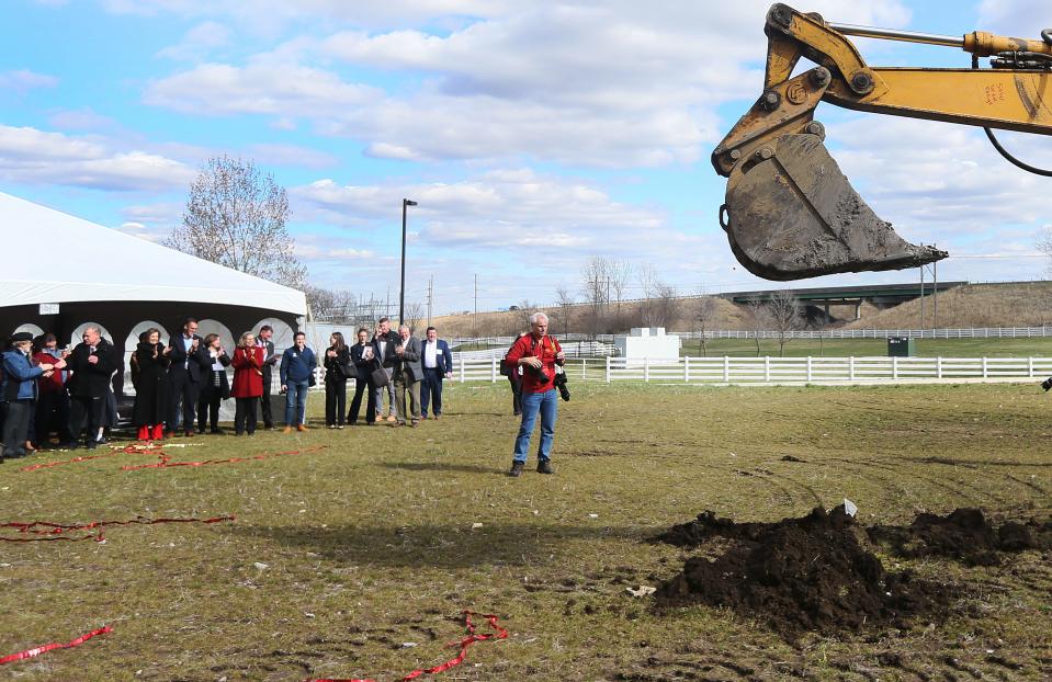 Dignitaries and visitors celebrate during the groundbreaking ceremony for Iowa State University's new Veterinary Diagnostic Laboratory on Thursday, April 4, 2024, in Ames, Iowa.