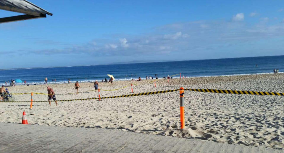 Main Beach, Noosa, is seen cordoned off for clean up after Schoolies 2020.