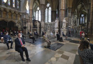 Attendees socially distance during a service to mark the 80th anniversary of the Battle of Britain at Westminster Abbey, London, Sunday, Sept. 20, 2020. (Aaron Chown/Pool Photo via AP)