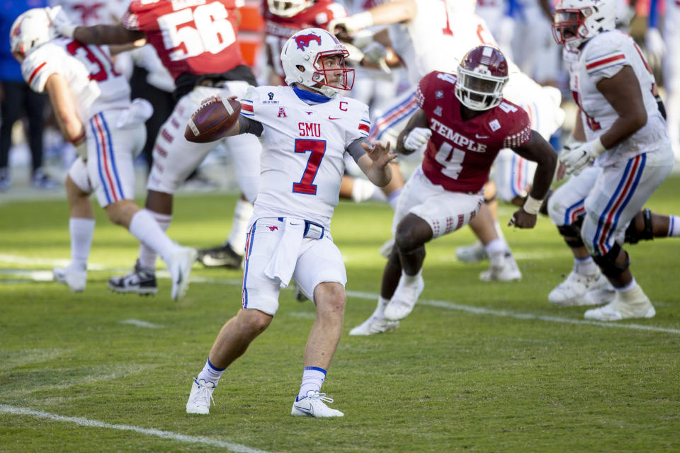 SMU quarterback Shane Buechele (7) looks to pass during the second half of an NCAA college football game against Temple, Saturday, Nov. 7, 2020, in Philadelphia. SMU won 47-23. (AP Photo/Laurence Kesterson)