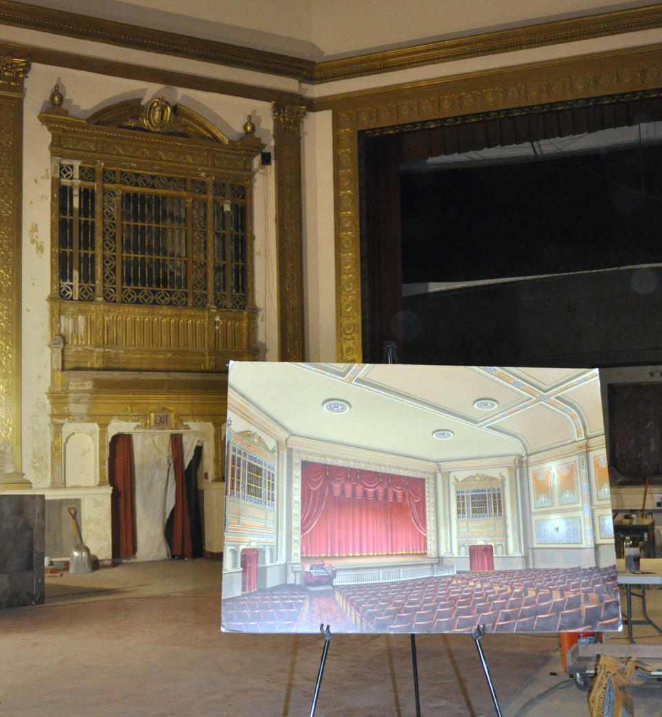 This Nov. 17, 2012 photo shows an artist rendering of the eventual restoration of the State Theatre on an easel inside the Sioux Falls, S.D., theater. The circa-1926 theater, closed since 1991, has been raising funds for its renovation and plans to begin showing movies again in 2013. (AP Photo/Dirk Lammers)3