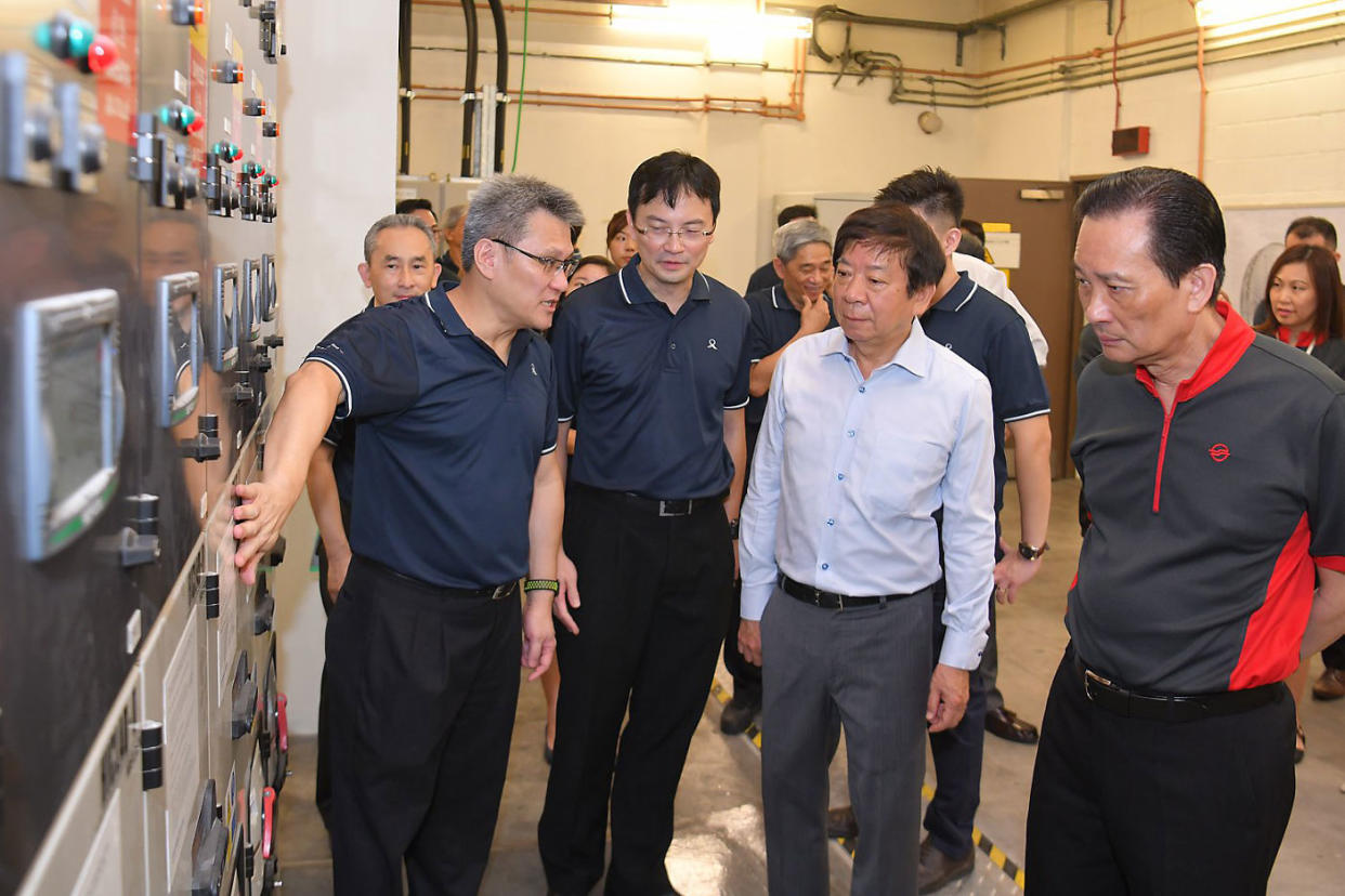 Transport Minister Khaw Boon Wan (second from right) visiting the plant room at Bukit Batok MRT station. (PHOTO: Facebook / Khaw Boon Wan)