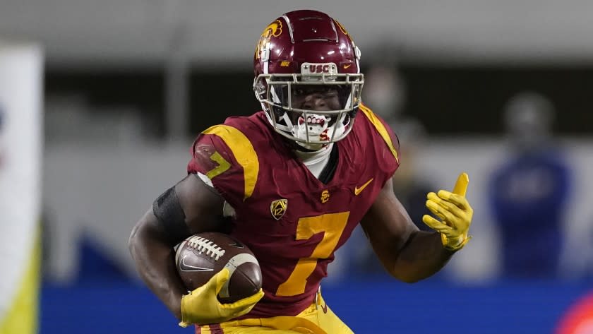 Southern California running back Stephen Carr (7) runs the ball during the second half.