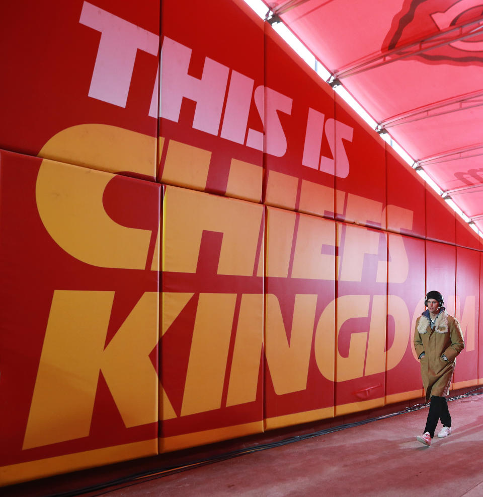 <p>New England Patriots quarterback Tom Brady heads back up the ramp to the visitor’s locker room past a giant sign on the wall that reads “This Is Chiefs Kingdom.” The Kansas City Chiefs host the New England Patriots in an NFL AFC Championship game at Arrowhead Stadium in Kansas City, MO on Jan. 20, 2019. (Photo by Jim Davis/The Boston Globe via Getty Images) </p>