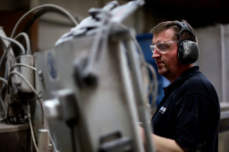 Man works in the Farrat factory in Altrincham