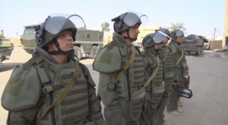 A still image taken from a video footage and released by Russia's Defence Ministry on September 29, 2017, shows Russian military de-mining engineers at work in Deir al-Zor, Syria. Russian Defence Ministry/Handout via REUTERS TV