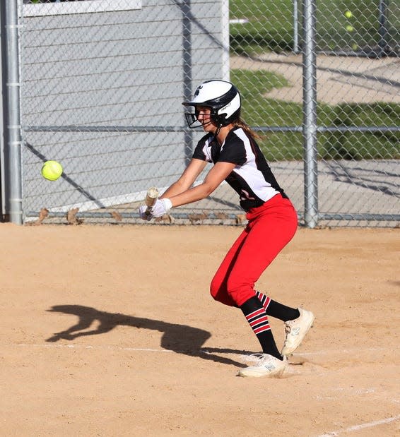 Roland-Story's Kamryn Lande lays down a bunt during the Norse softball team's 9-2 victory over Perry June 1 at Roland.
