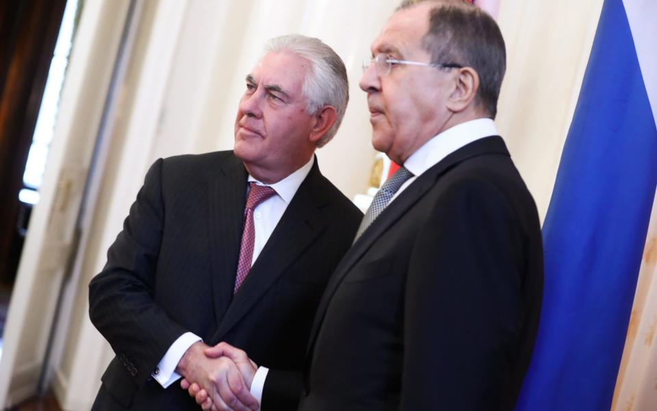 US Secretary of State Rex Tillerson (L) and Russia's Foreign Minister Sergei Lavrov shake hands in Moscow - Credit:  TASS / Barcroft Images