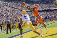 Florida wide receiver Justin Shorter (4) scores a touchdown against LSU safety Jay Ward (5) in the first half of an NCAA college football game in Baton Rouge, La., Saturday, Oct. 16, 2021. (AP Photo/Matthew Hinton)
