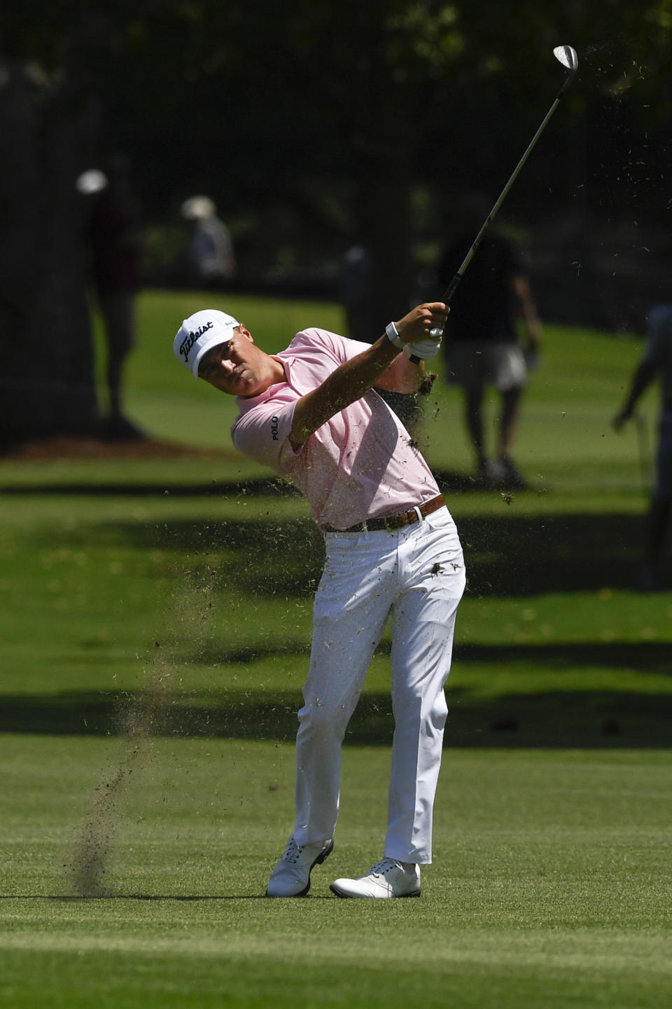 Justin Thomas hits from the third fairway during the first round of the Tour Championship golf tournament Thursday, Aug. 22, 2019, in Atlanta. (AP Photo/John Amis)