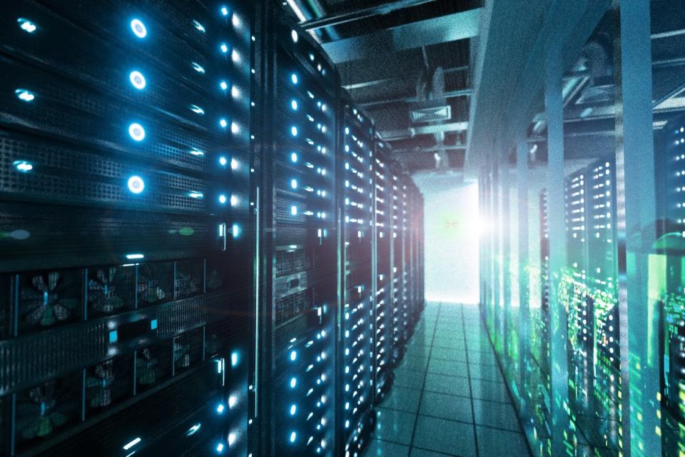 A server room with glowing server racks.