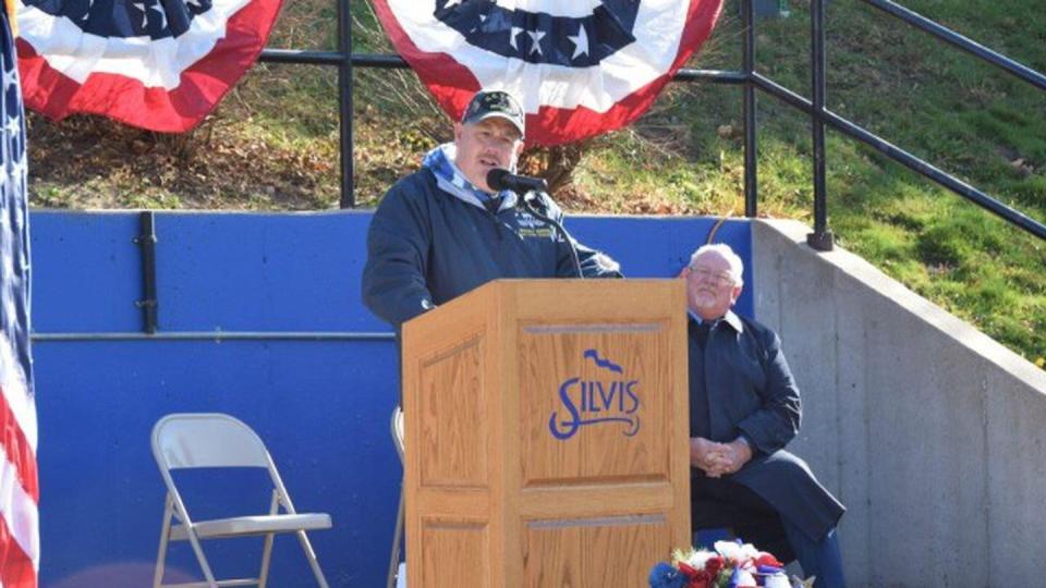 Brian Muños delivers remarks at the annual Veterans Day Ceremony held on Nov. 11 at the Hero Street Memorial Park. Muños regularly speaks at Memorial Day and Veterans' Day events on the street. (Mark A. Kane/Army)