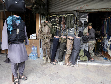 A shop selling military supplies is seen in the city of Idlib, Syria May 23, 2019. REUTERS/Khalil Ashawi