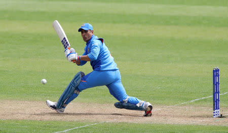 Cricket - ICC Cricket World Cup warm-up match - Bangladesh v India - Cardiff Wales Stadium, Cardiff, Britain - May 28, 2019 India's MS Dhoni in action Action Images via Reuters/Peter Cziborra