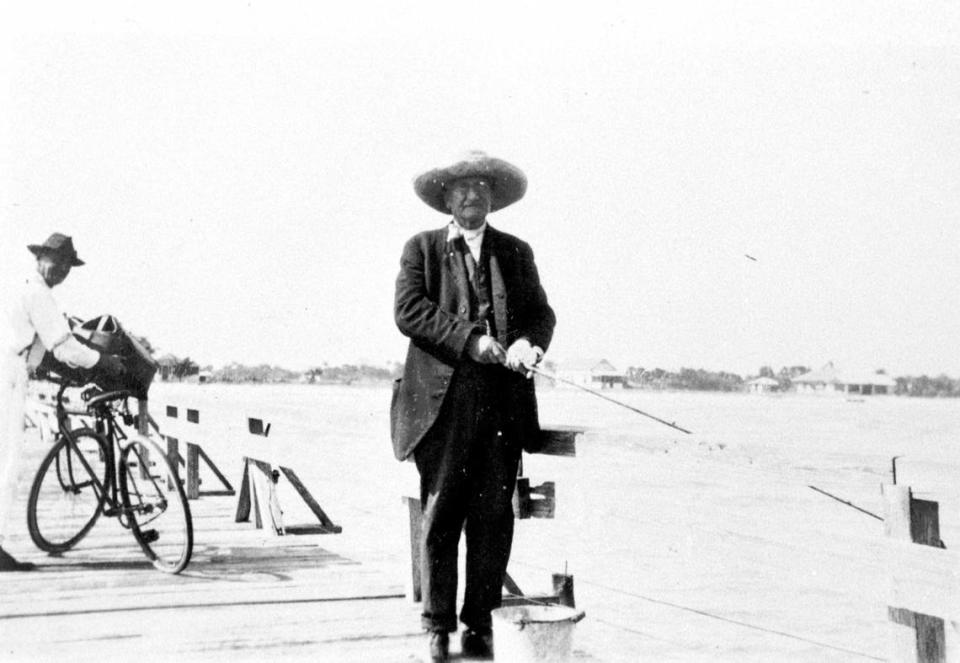 A man fishes on the Anna Maria City Pier in 1920.