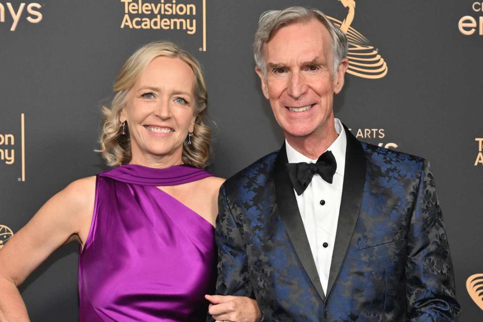 <p>Michael Buckner/Variety/Getty</p> Liza Mundy and Bill Nye at the Creative Arts Emmy Awards in 2022.