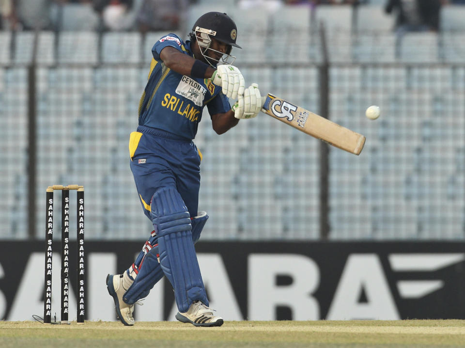 Sri Lanka’s Kusal Perera plays a shot during the first Twenty 20 cricket match against Bangladesh in Chittagong, Bangladesh, Wednesday, Feb. 12, 2014. Sri Lanka won by 2 runs. (AP Photo)