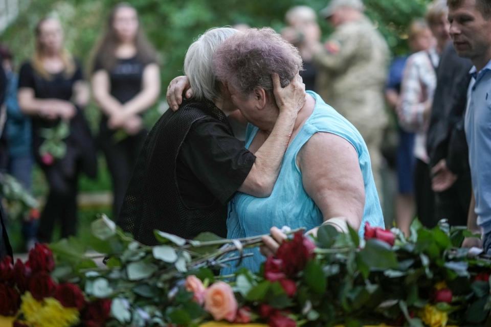 Mourners attend the funeral of Ukrainian soldier Valentyn Zvyryk who was killed fighting in the Kharkiv (Getty)