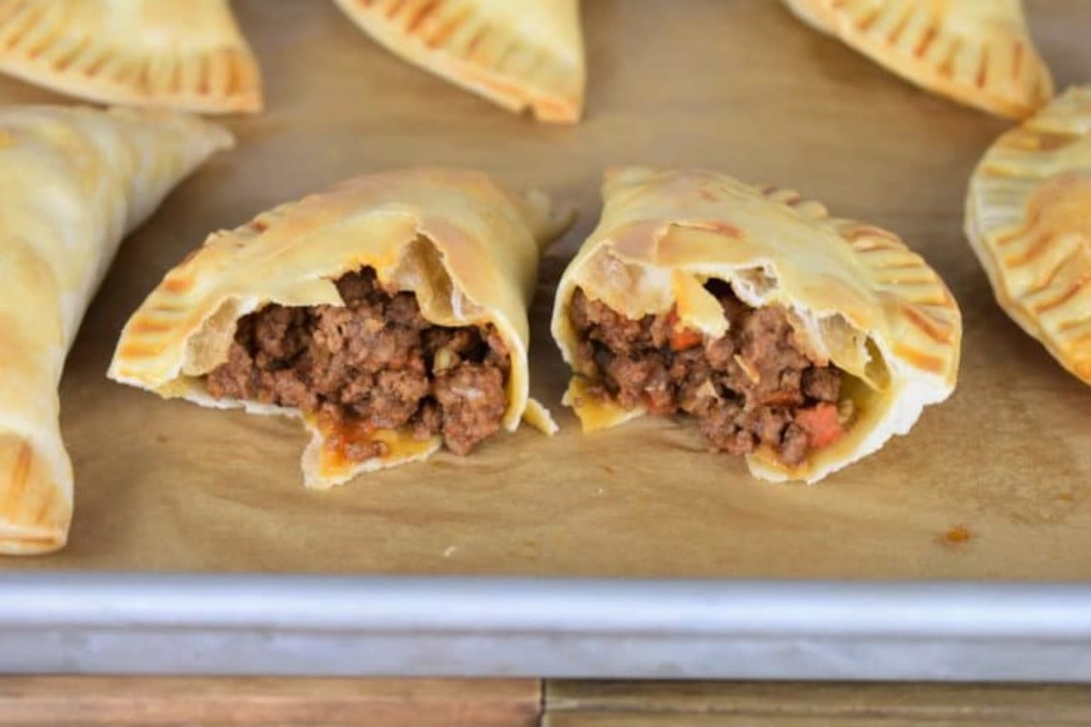 <p>Cook 2 Eat Well</p><p> These beef empanadas are baked not fried.</p><p><strong>Get the recipe:</strong> <a href="https://www.cook2eatwell.com/baked-beef-empanadas/" rel="nofollow noopener" target="_blank" data-ylk="slk:Baked Beef Empanadas;elm:context_link;itc:0;sec:content-canvas" class="link rapid-noclick-resp">Baked Beef Empanadas</a></p>