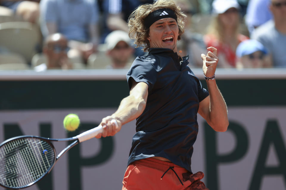 Germany's Alexander Zverev plays a shot against South Africa's Lloyd Harris during their first round match of the French Open tennis tournament at the Roland Garros stadium in Paris, Tuesday, May 30, 2023. (AP Photo/Aurelien Morissard)