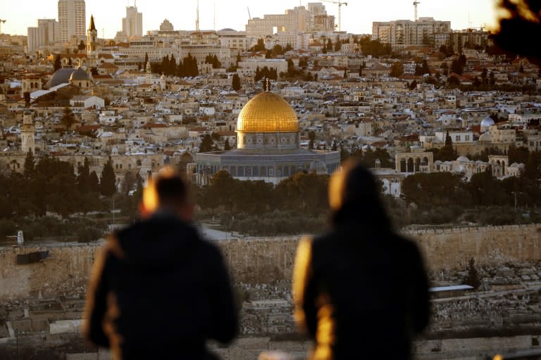 The sun sets over Jerusalem on January 23, 2017