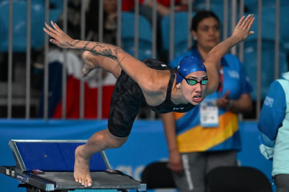 Brazil's Ana Carolina Vieira competes in the women's 100m freestyle heat 4 swimming event of the Pan American Games Santiago 2023 at the Aquatics Centre in the National Stadium Sports Park in Santiago on October 23, 2023. (Photo by MAURO PIMENTEL / AFP) (Photo by MAURO PIMENTEL/AFP via Getty Images)