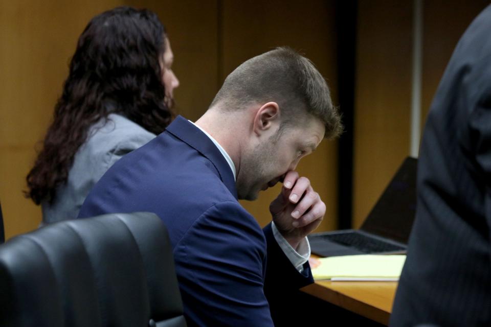 Christopher Gregor wipes his face during medical expert testimony before Superior Court Judge Guy P. Ryan in Toms River Wednesday, May 8, 2024. Gregor is charged with the 2021 murder and child endangerment of his 6-year-old son Corey Micciolo.