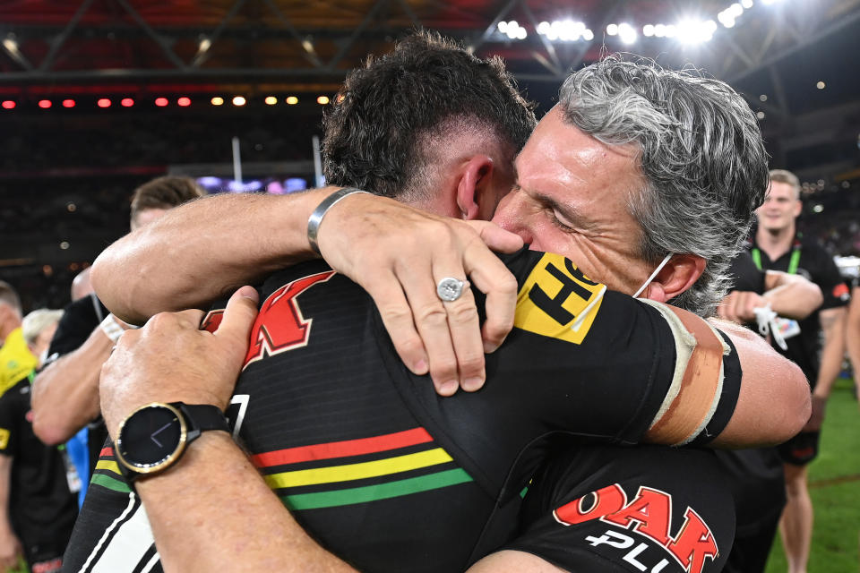 Pictured here, Penrith's Nathan Cleary hugs his father and coach Ivan after winning the 2021 NRL grand final.