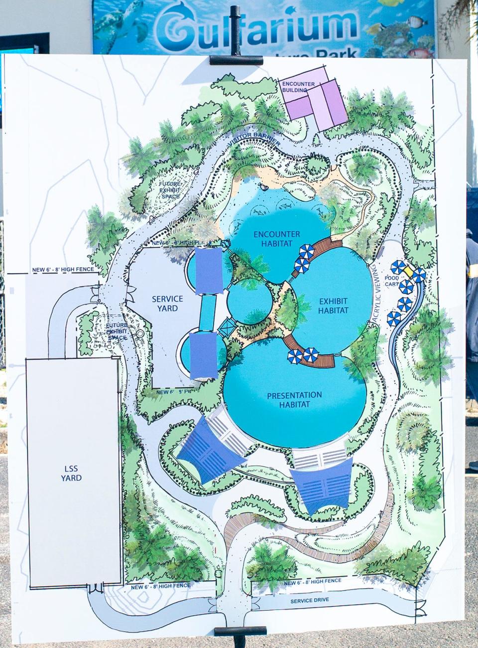 A map shows the intended expansion and integration of the Dolphin Oasis area during a groundbreaking ceremony at the Gulfarium Marine Adventure Park on Okaloosa Island.