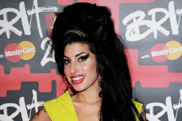 <p>Dave Hogan/Getty</p> Amy Winehouse in London in February 2007