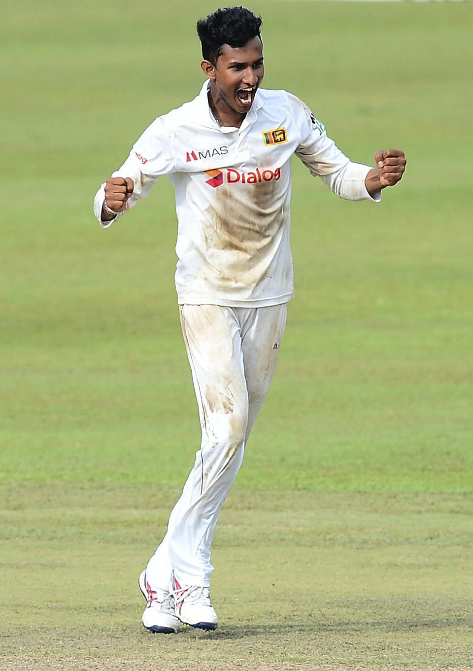 Sri Lanka's Praveen Jayawickrama celebrates the dismissal of Bangladesh's Mehidy Hasan during the third day of the second cricket test match between Sri Lanka and Bangladesh in Pallekele, Sri Lanka, Sunday, May 01, 2021.( AP Photo/Sameera Peiris)