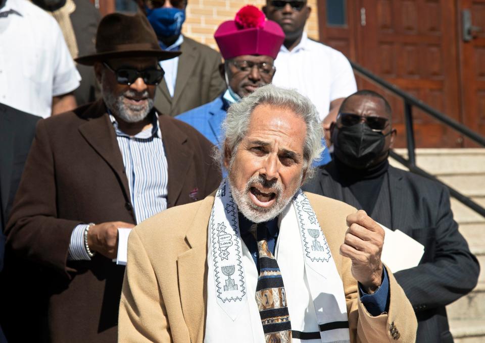 Rabbi Barry Silver of Congregation L’Dor Va’Dor in Boynton Beach, speaks during a news conference held by the Palm Beach County Clergy Alliance in West Palm Beach Monday, Nov. 29, 2021 to oppose what it calls the three Vs under Gov. Ron DeSantis: voter opposition, voting restrictions and vigilante endorsement, the state's anti-riot law.