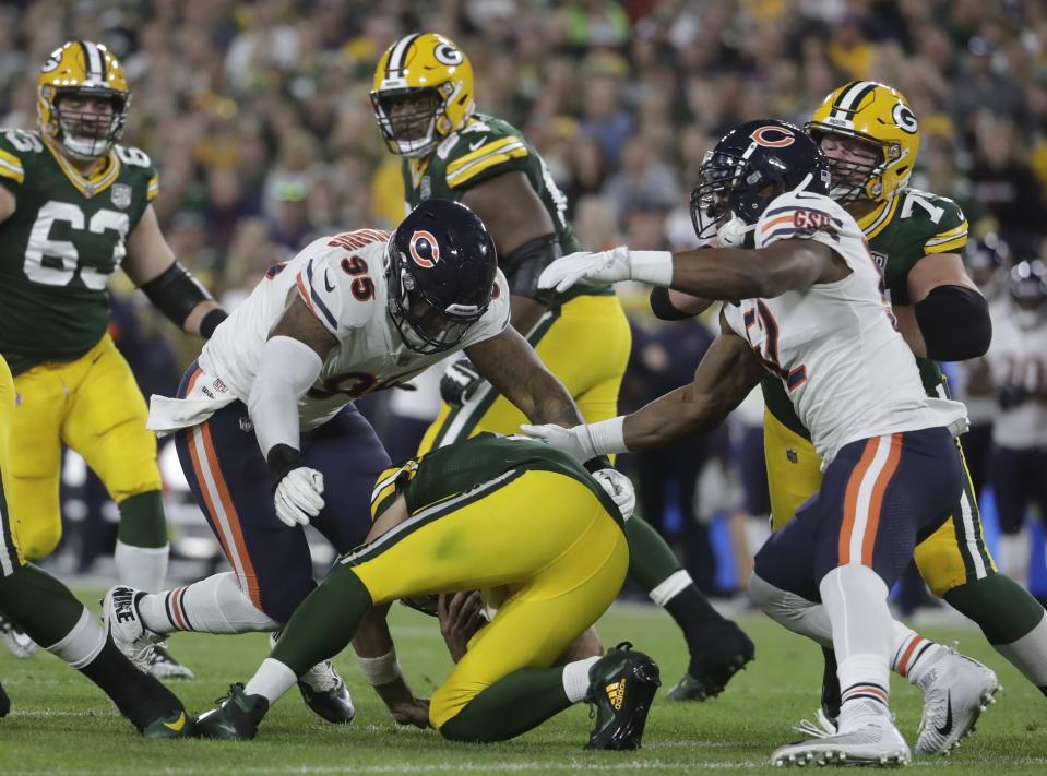 Green Bay Packers quarterback Aaron Rodgers is hurt after being sacked during the first half of an NFL football game against the Chicago Bears Sunday, Sept. 9, 2018, in Green Bay, Wis. (AP Photo/Morry Gash)