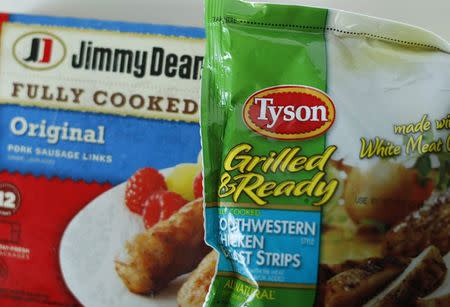 Tyson foods Inc and Hillshire Brands Jimmy Dean sausages are shown in this photo illustration in Encinitas, California May 29, 2014. REUTERS/Mike Blake