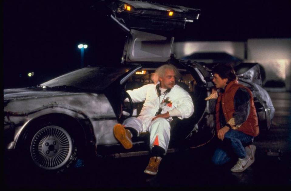 Emmett “Doc” Brown (Christopher Lloyd), left, and Marty McFly (Michael J. Fox) in a scene from the 1985 film “Back to the Future.”