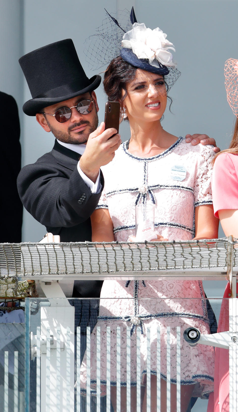 EPSOM, UNITED KINGDOM - JUNE 01: (EMBARGOED FOR PUBLICATION IN UK NEWSPAPERS UNTIL 24 HOURS AFTER CREATE DATE AND TIME) Ryan Thomas and Lucy Mecklenburgh watch the racing as they attend 'Derby Day' of the Investec Derby Festival at Epsom Racecourse on June 1, 2019 in Epsom, England. (Photo by Max Mumby/Indigo/Getty Images)