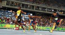 2016 Rio Olympics - Athletics - Final - Men's 110m Hurdles Final - Olympic Stadium - Rio de Janeiro, Brazil - 16/08/2016. Omar McLeod (JAM) of Jamaica crosses the finish line to win the gold. REUTERS/Kai Pfaffenbach