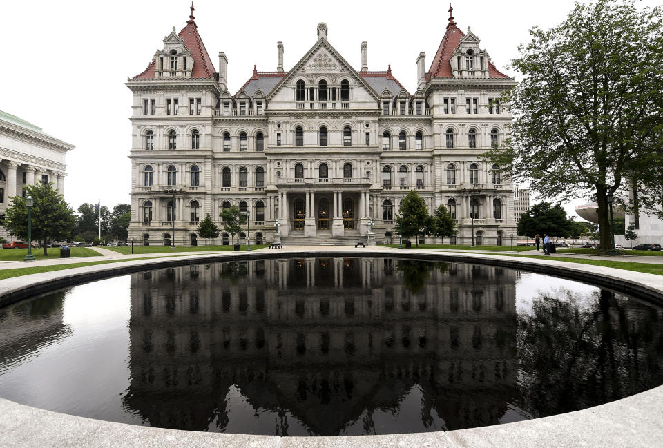 Exterior view of the New York state Capitol Wednesday, June 19, 2019, in Albany, N.Y. Legal marijuana, new rights for farmworkers and a stronger legal standard for sexual harassment are among the final issues being debated by New York state lawmakers Wednesday, the day they are scheduled to adjourn their 2019 session. (AP Photo/Hans Pennink)