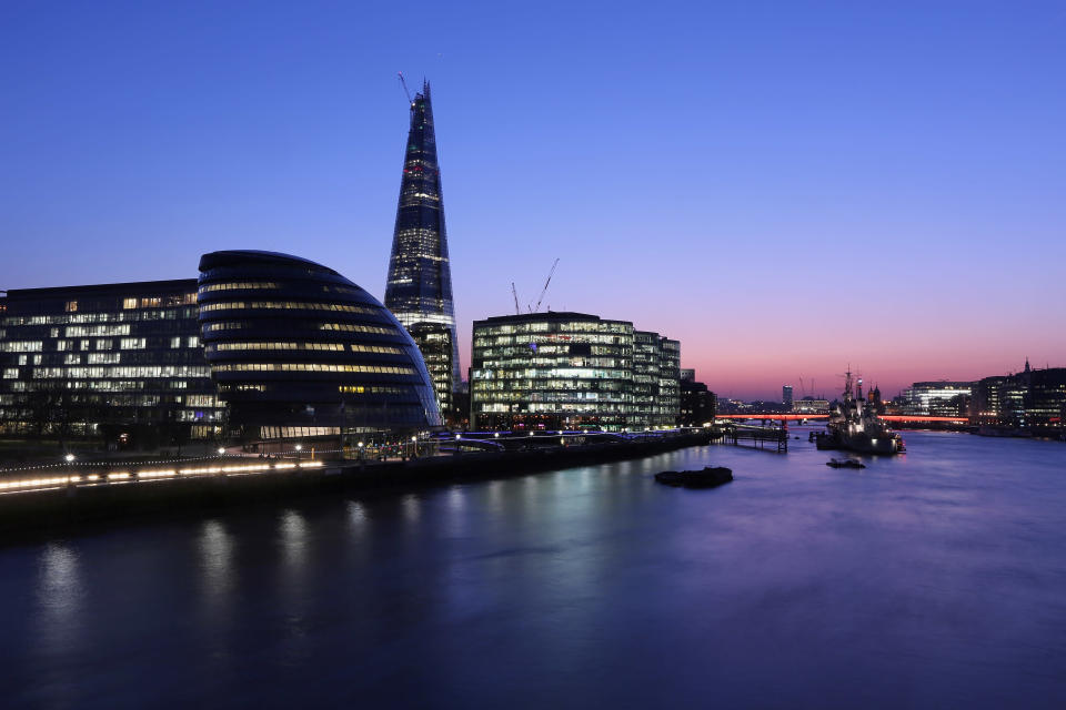 The view of the River Thames looking west from Tower Bridge including The Shard Skyscraper, City Hall and HMS Belfast at night in London, England. (Photo by Oli Scarff/Getty Images)