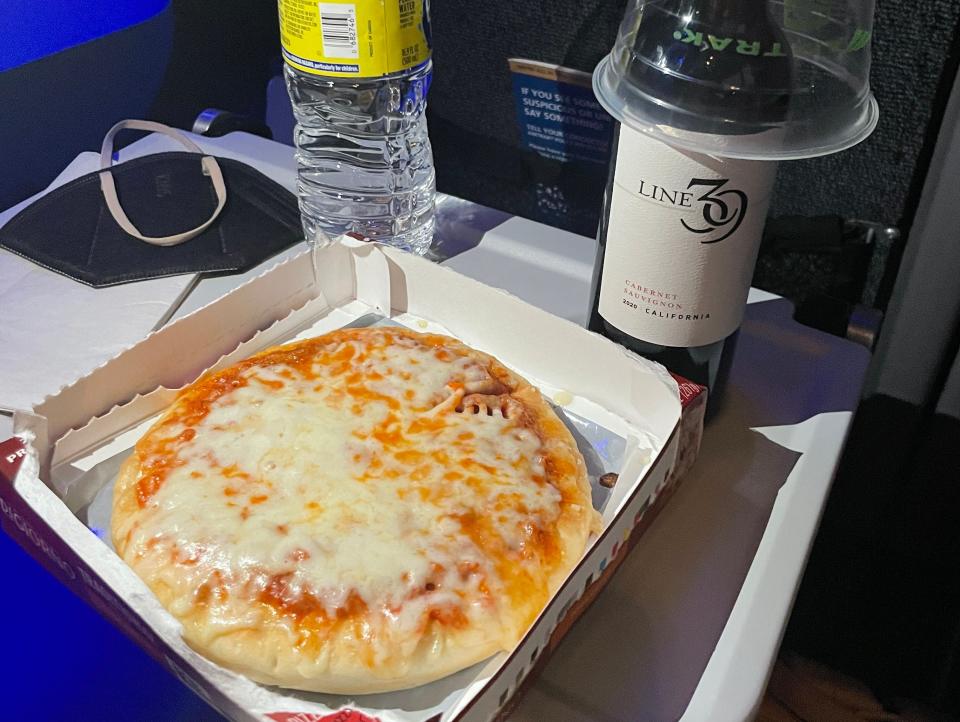 amtrak small pizza and bottle of wine