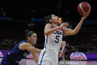 United States' Kelsey Plum takes shot at goal as Serbia's Sasa Cado attempts to block during their quarterfinal game at the women's Basketball World Cup in Sydney, Australia, Thursday, Sept. 29, 2022. (AP Photo/Mark Baker)