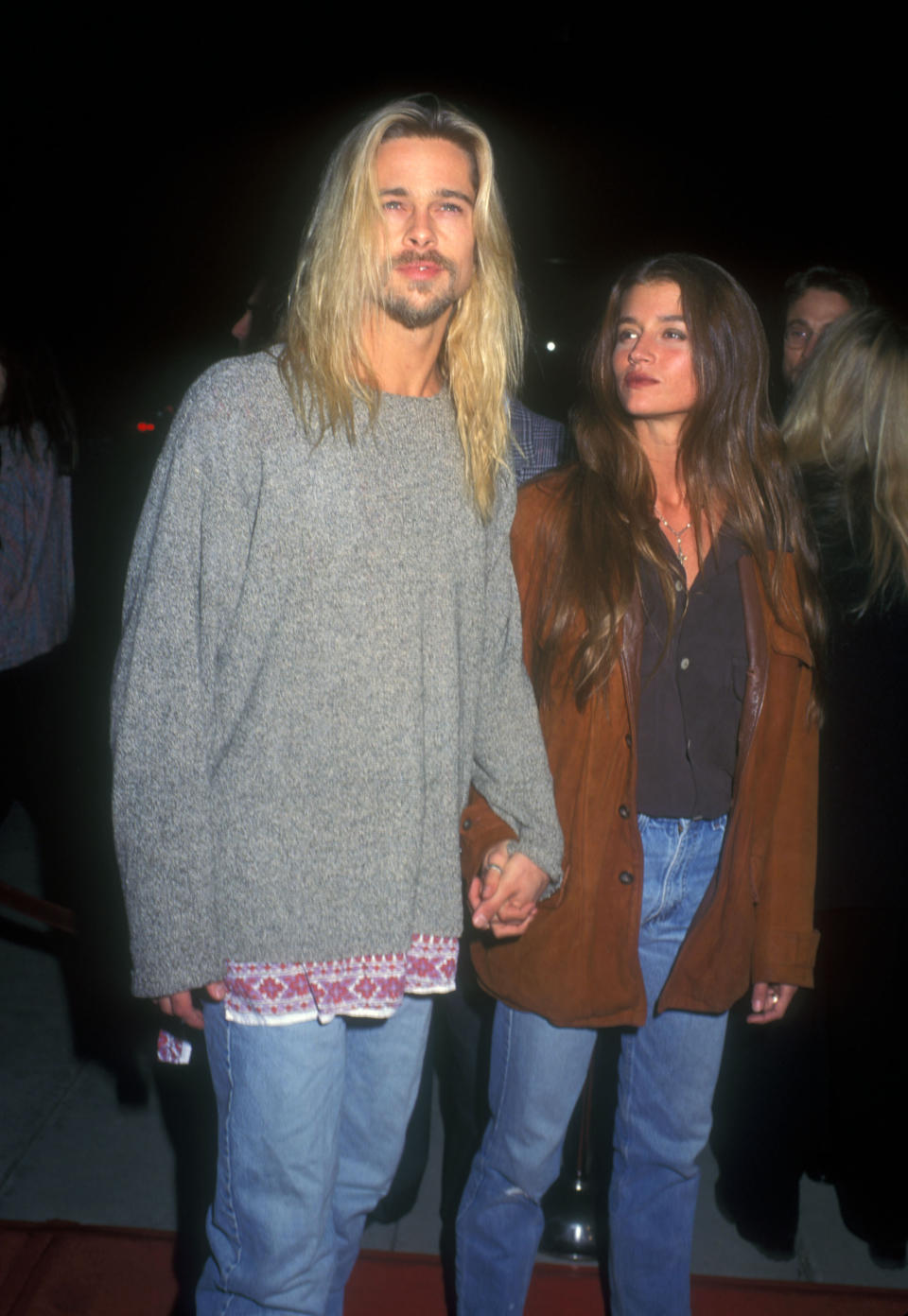 <p>In 1994, Brad channeled his inner hippie when he stepped out with then girlfriend Jitka Pohledek, who wore her shiny locks in a boho down style. Photo: Getty Images </p>