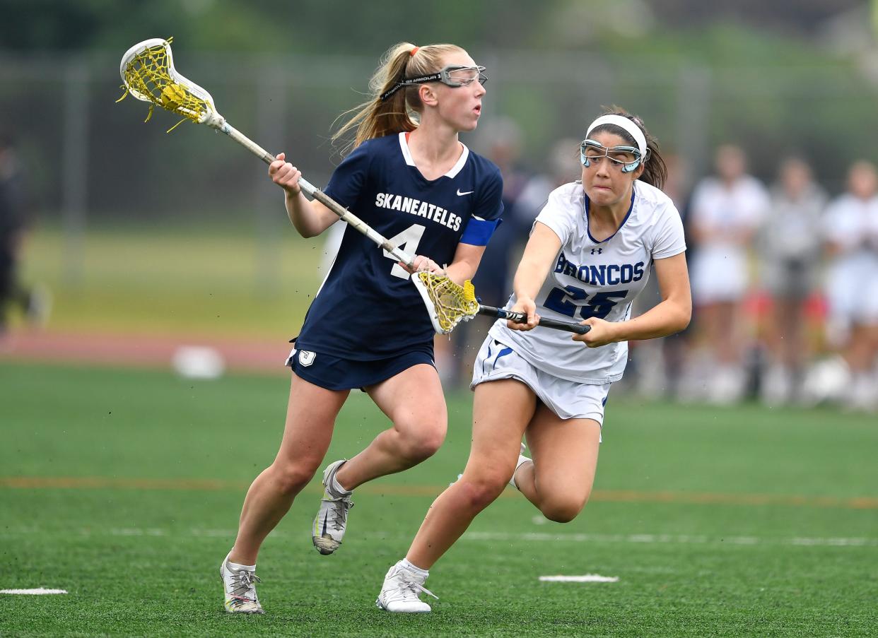 Bronxville's Amy Villanueva, right, defends against Skaneateles' Julia O'Connor during the NYSPHSAA Girls Lacrosse Championships Class D final in Cortland, N.Y., Saturday, June 10, 2023. Bronxville’s season ended with an 11-6 loss to Skaneateles.