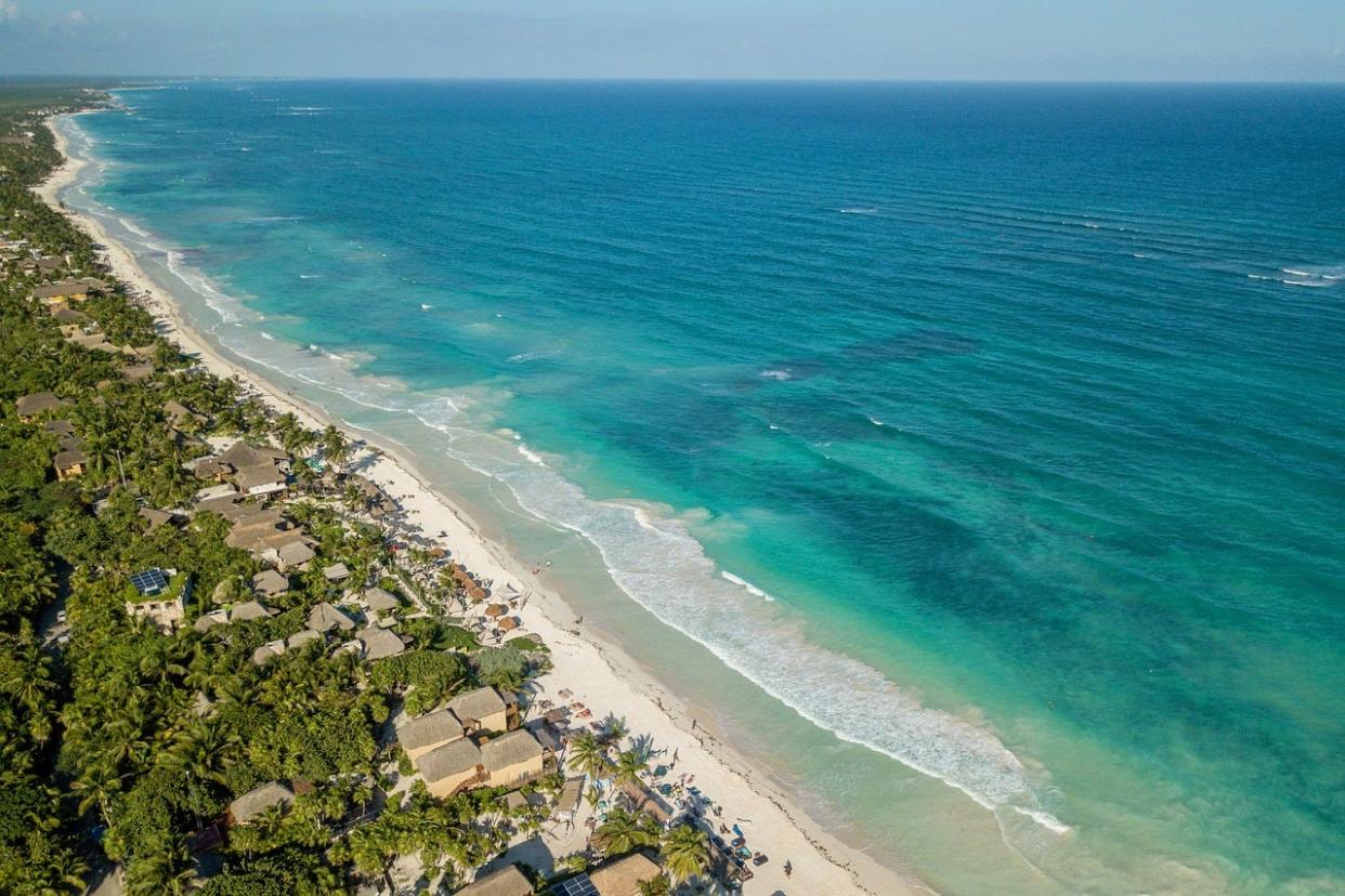 Beaches, like this one in  Tulum, Mexico, beat amusement parks, national parks and mountain towns as the leading destination.