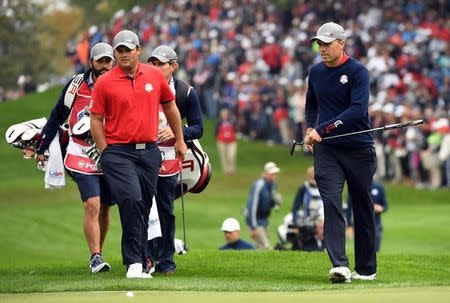 Sep 30, 2016; Chaska, MN, USA; Jordan Spieth of the United States and Patrick Reed of the United States on the eighth green in the morning foursome matches during the 41st Ryder Cup at Hazeltine National Golf Club. Mandatory Credit: John David Mercer-USA TODAY Sports