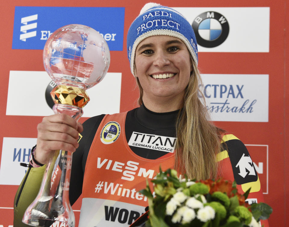 Natalie Geisenberger of Germany celebrates her victory in women competition at the Luge World Cup 2018/2019 in Sochi, Russia, Saturday, Feb. 23, 2019. (AP Photo/Ekaterina Lyzlova)