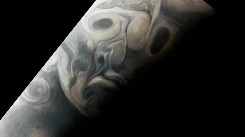 Spooky Jupiter Face Seen in Clouds by NASA Juno Perijove 54