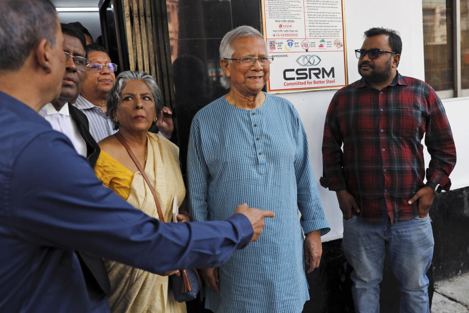 Nobel laureate Muhammad Yunus, center, comes out of a courtroom after he was granted bail in an embezzlement case, in Dhaka, Bangladesh, Sunday, Mar. 03, 2024. (AP Photo/Mahmud Hossain Opu)